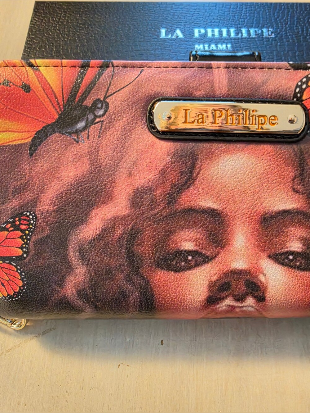 La Phillipe Women's Butterfly Print Wallet in Red and Orange